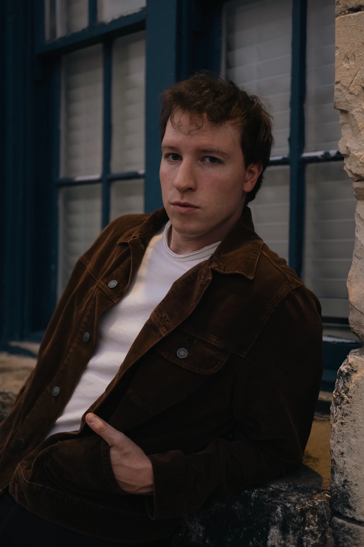leaning on window